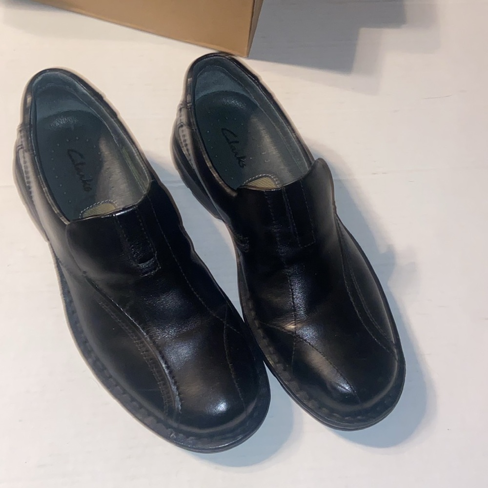 Clarks Escalate black slip on loafers size 10M with original box.